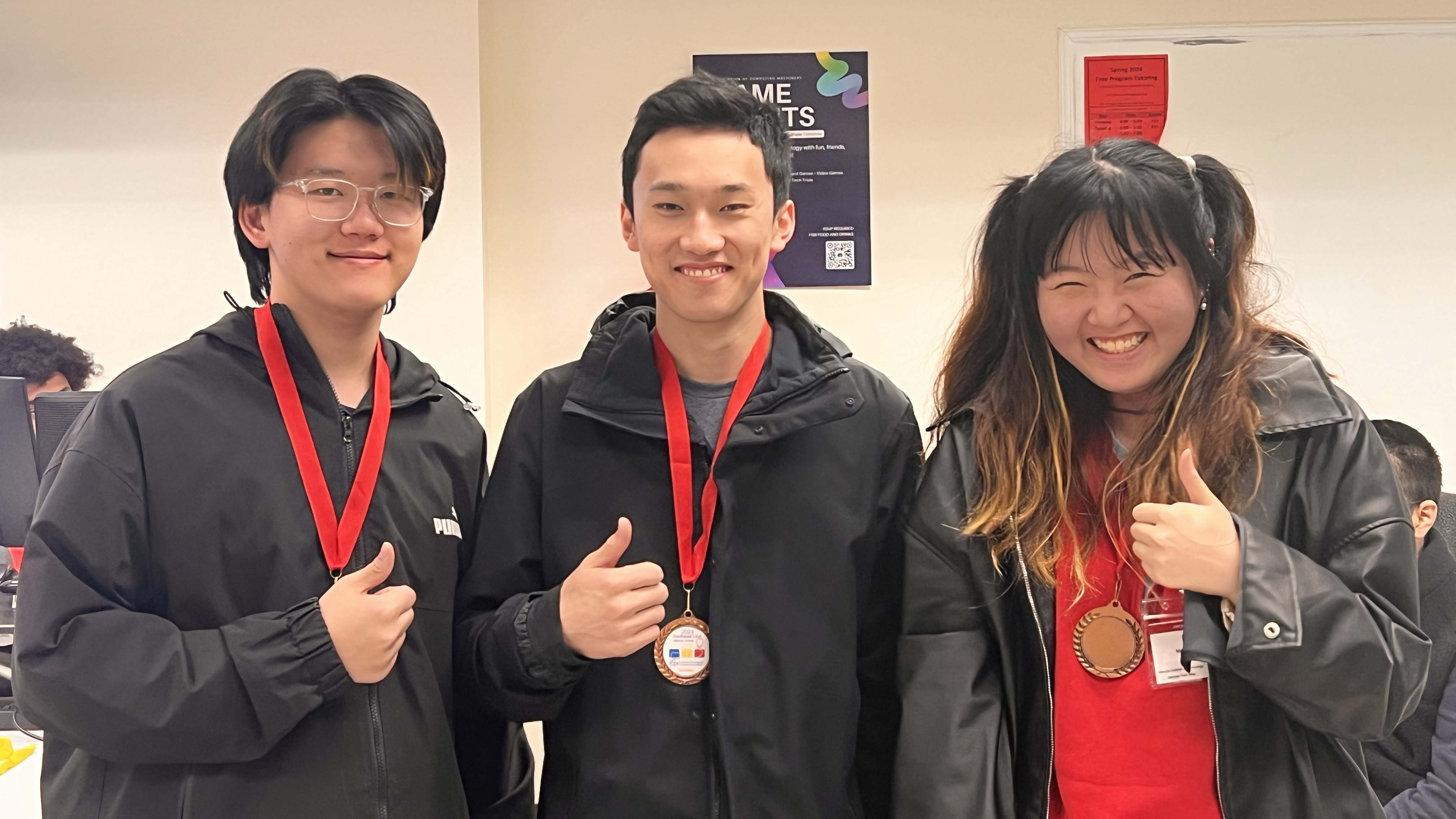 Raymond Bian, Jon Wang, and Marianna Cao competed as a team at the ICPC Regional Competition. Photos by Edward Chen