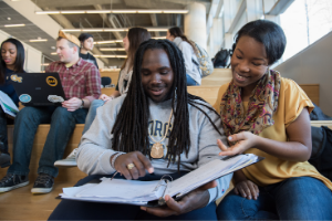 students talking at table