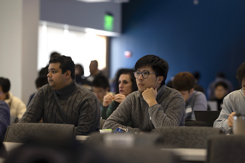Attendees listen intently during CRNCH Summit 2023 at Georgia Tech