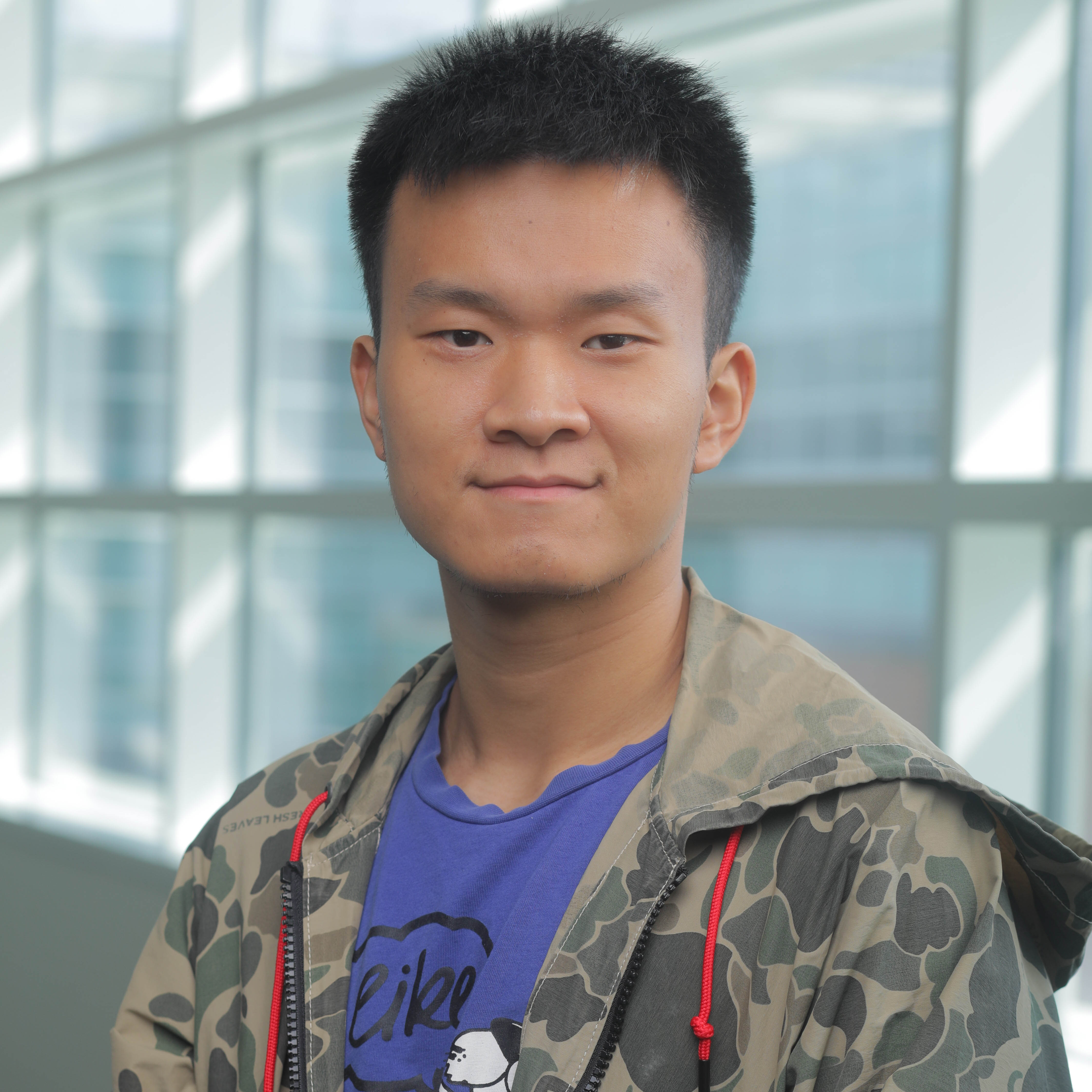 Man with short hair wearing a jacket