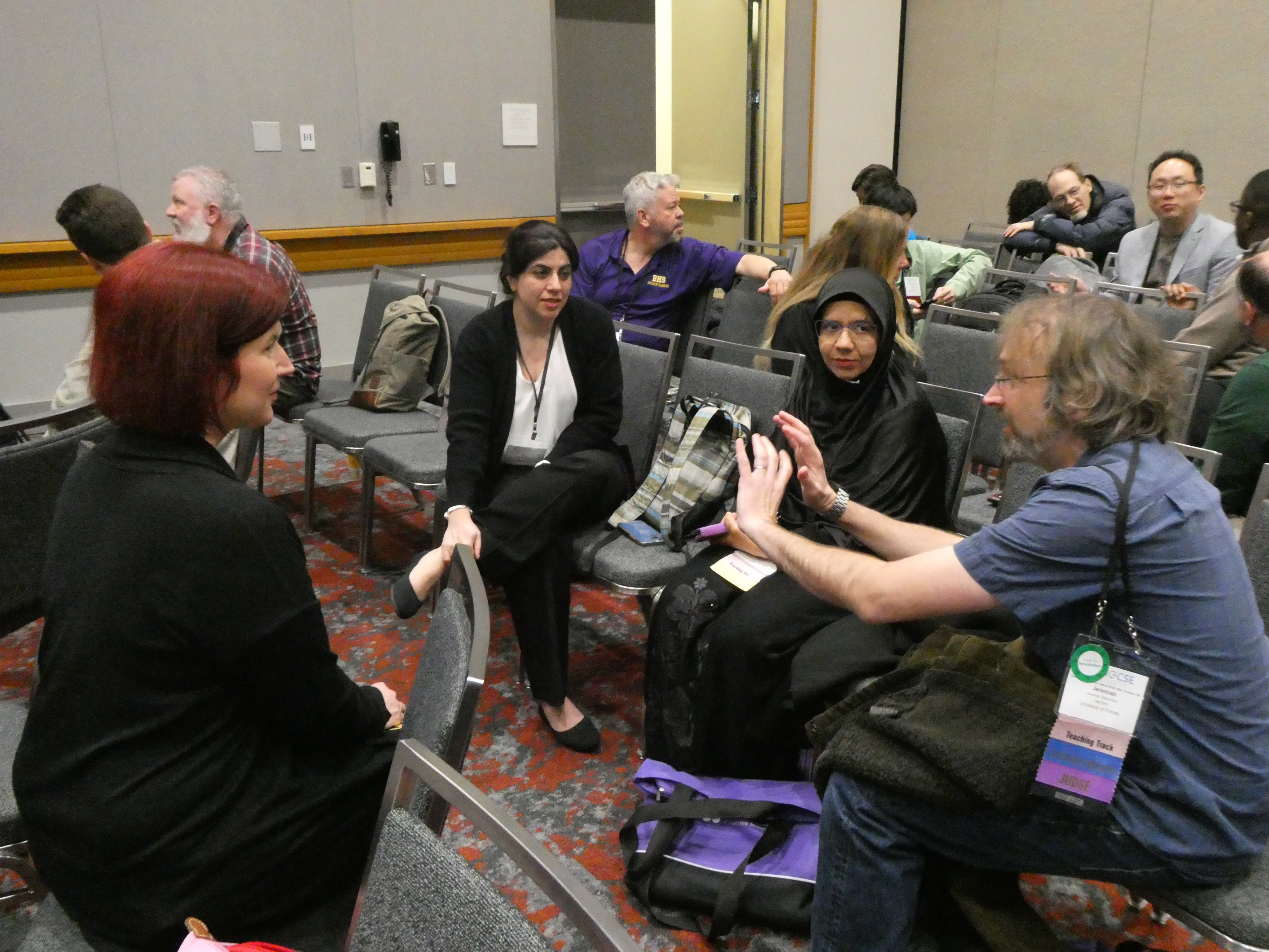 Fitzpatrick partakes in a discussion about Capstone courses with one of the work groups.