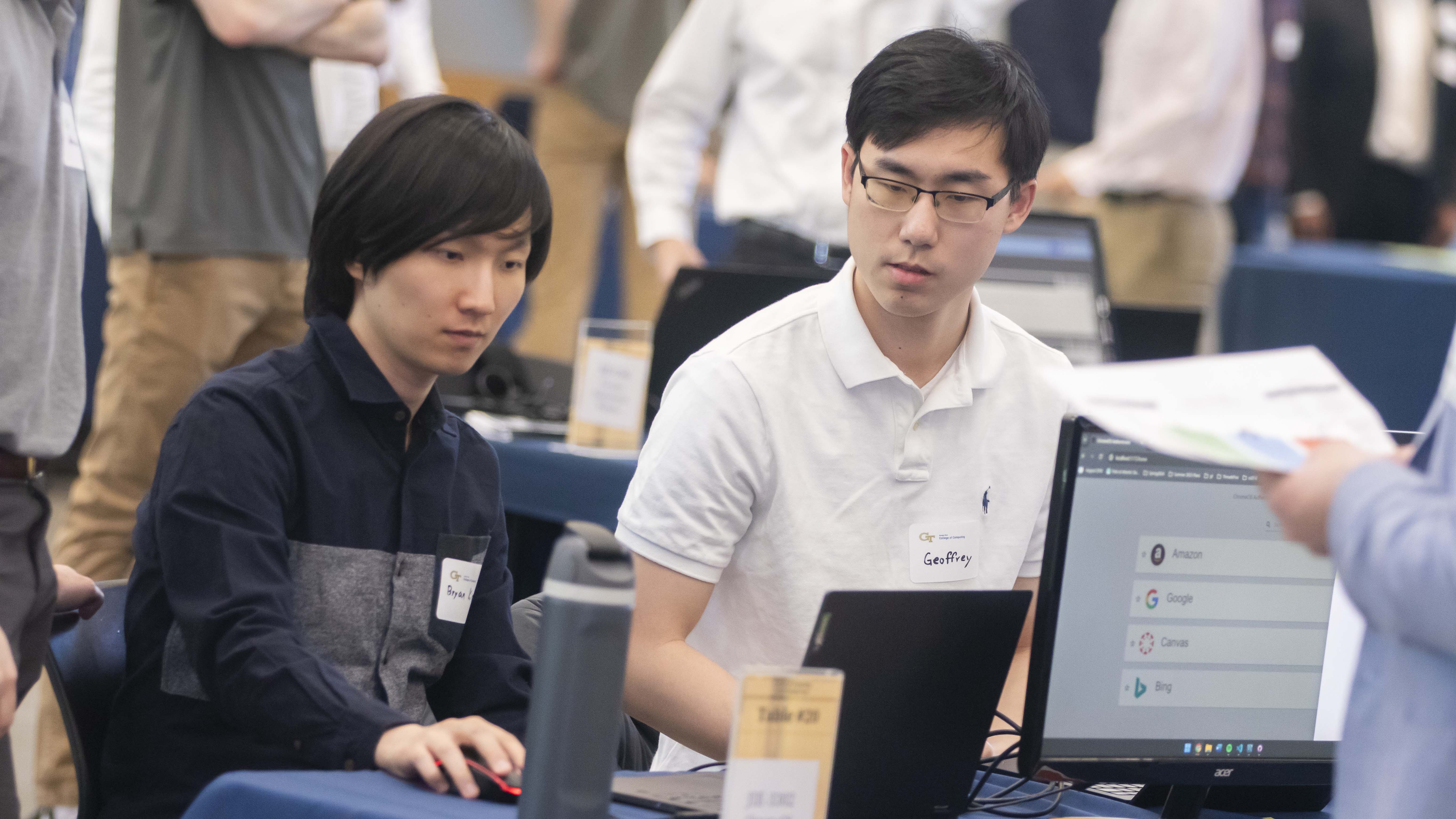 Students present their software design projects at the Spring 2024 Capstone Expo. Over the summer, students will use AI tools during the program. Photos by Terence Rushin/ College of Computing.
