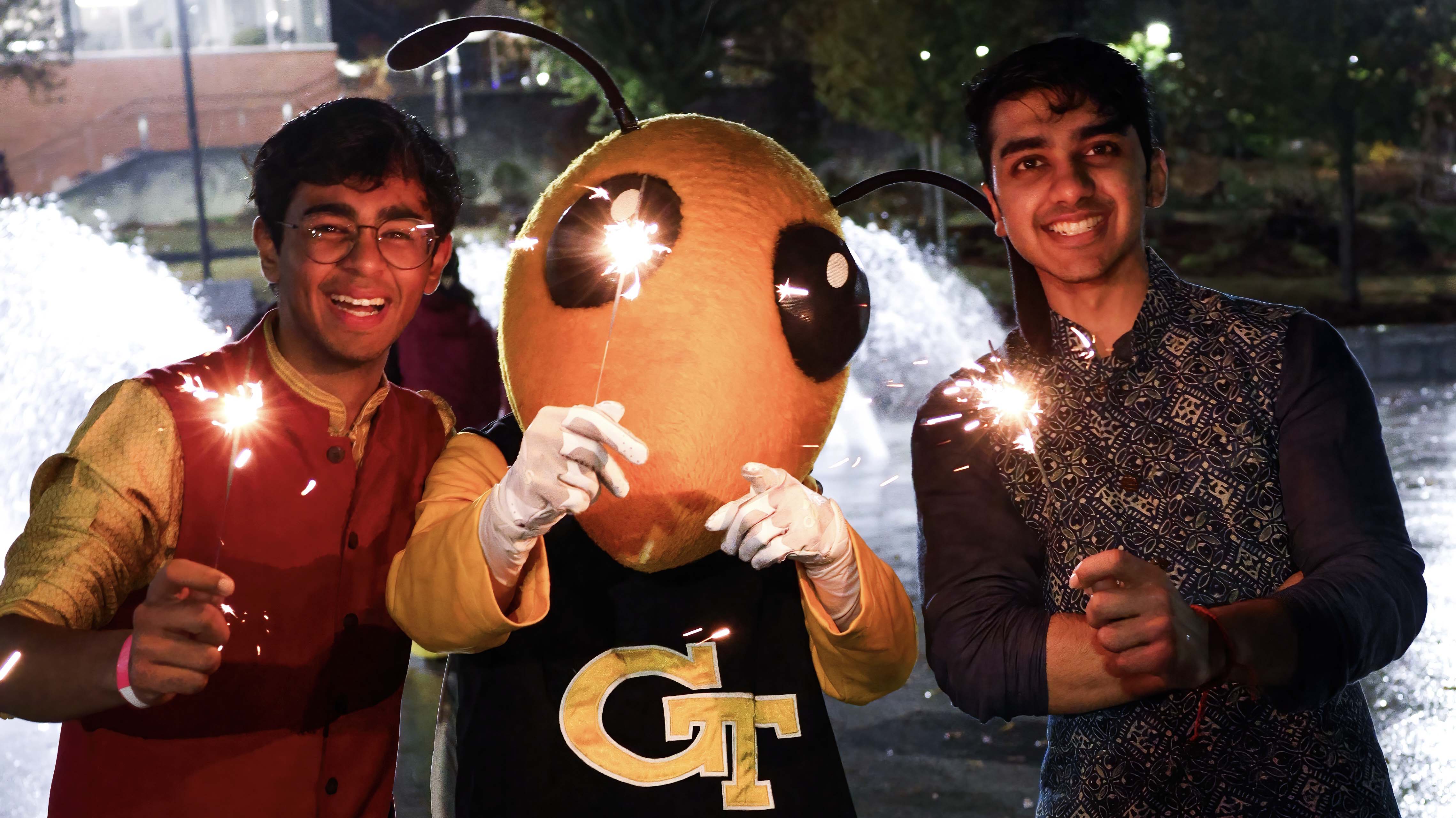 Pratham with Buzz at a student event. Photo by Tyler Parker.