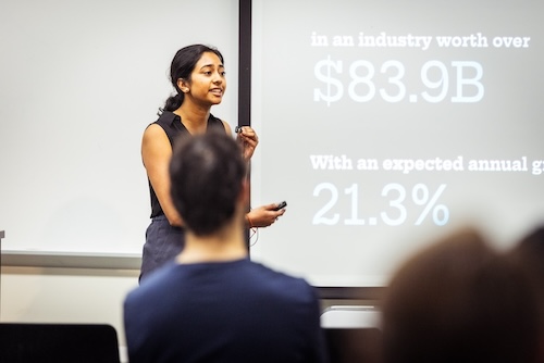 A student co-founder pitches her team's startup during the 5th Annual Klaus Startup Challenge at Georgia Tech