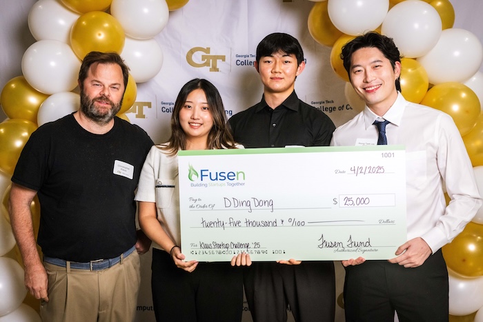 Above: Team DDingDong with the Challenge's namesake, Christopher W. Klaus. Photo by Kevin Beasley/College of Computing
