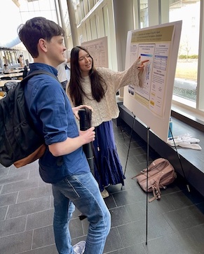 Students present posters at the CRNCH Summit.