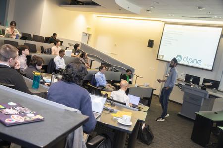 lecture room with speaker giving presentation
