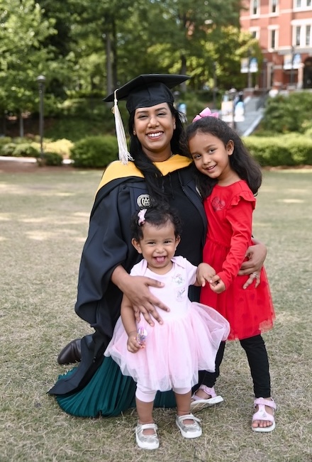 New GT alumna Karina Islam poses with her daughters at Georgia Tech.