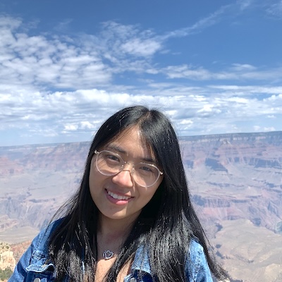 An exterior photo of Georgia Tech PhD student Mingyi Liu with blue sky and canyon-linkedin.jpg