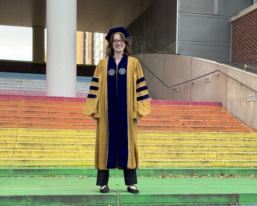 woman standing on staircase