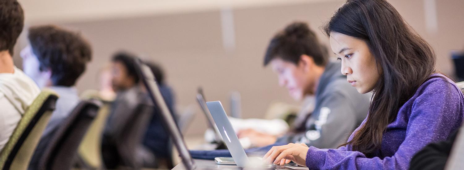 Students working on computers in a classroom