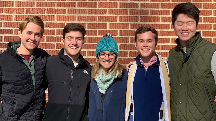 A group of undergrad CS majors at Georgia Tech posing against brick wall