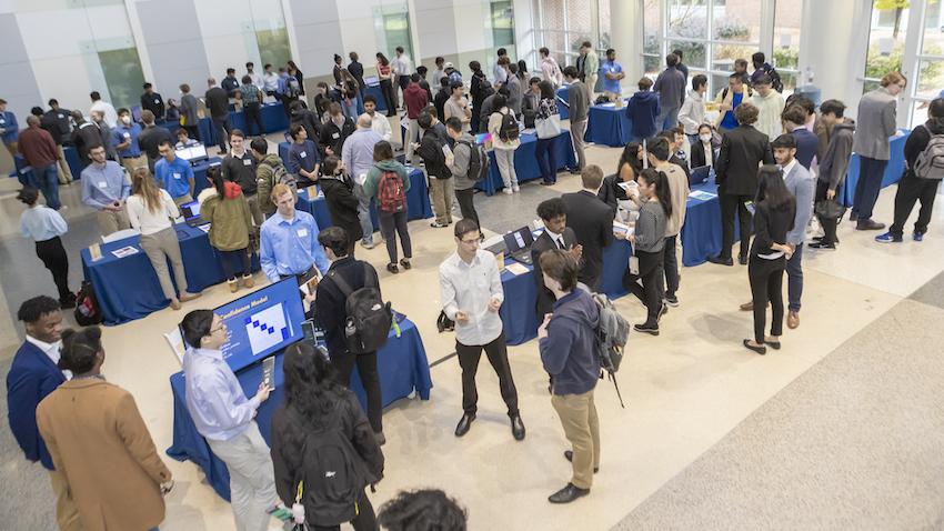 Wide shot of CS Junior Design Capstone Expo at Georgia Tech in the Klaus Advanced Computing Building