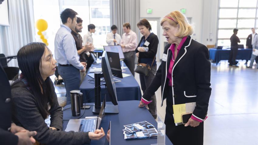 Lecturer Kristine Nigel judges at the Spring Expo.