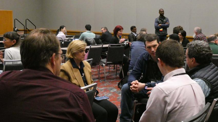 Attendees discuss Capstone programs