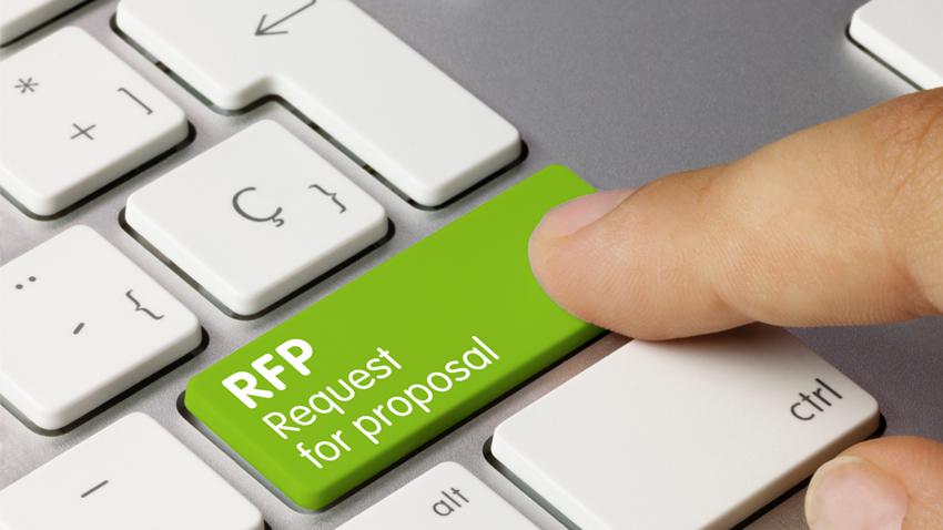 Finger pressing button labelled "RFP: Request for Proposal"