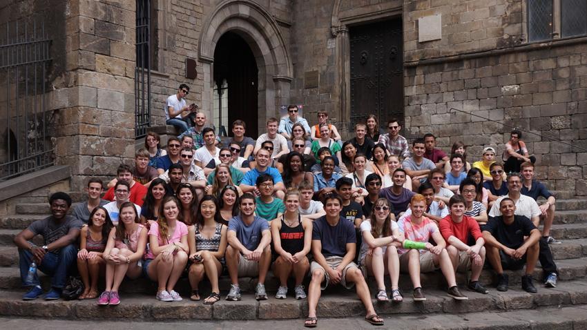 Study abroad students in front of a European building