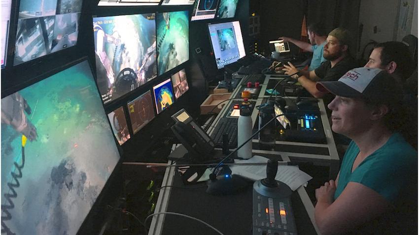 Ocean scientists looking at computer screens
