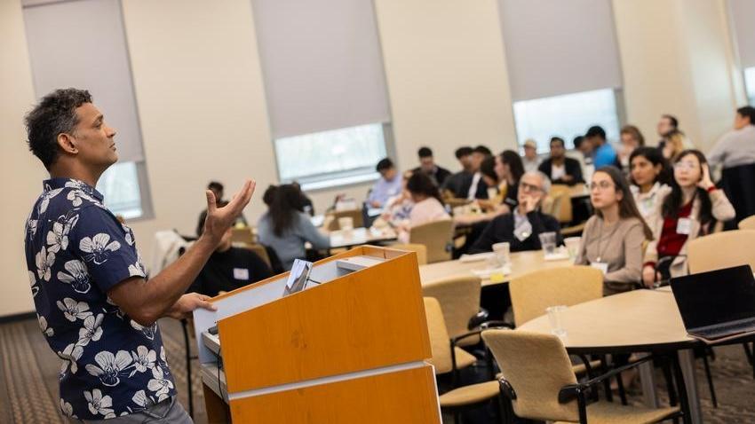 man presenting at lecture