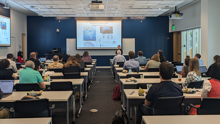 Faculty members at a research mixer