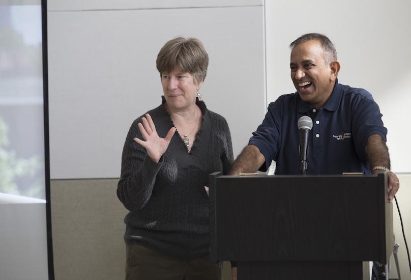 Ellen Zegura and Kishore Ramachandran at podium