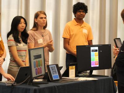 The student team presents their app to Judge and School of Computing Instruction Lecturer Ronnie Howard at the CS Junior Design Capstone Expo. Photos by Gregory White.