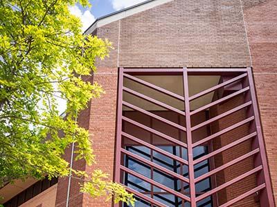 Father and son, Sababu and Tai'Re Barashango, share a bond through CS at Georgia Tech; Sababu as a Center for Education Fellow and Tai'Re as a graduating CS major. Photos by Kevin Beasley/ College of Computing.