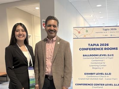 CS major Cindy Muniz with GT Computing Dean Vivek Sarkar at Tapia 2026 in Atlanta.