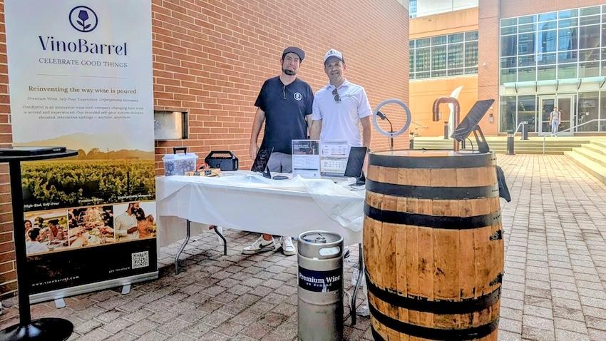 GT alumni Christian Doetsch (left) and Seth Lytle showcasing VinoBarrel, their startup, at Tech Square, Aug. 2026.