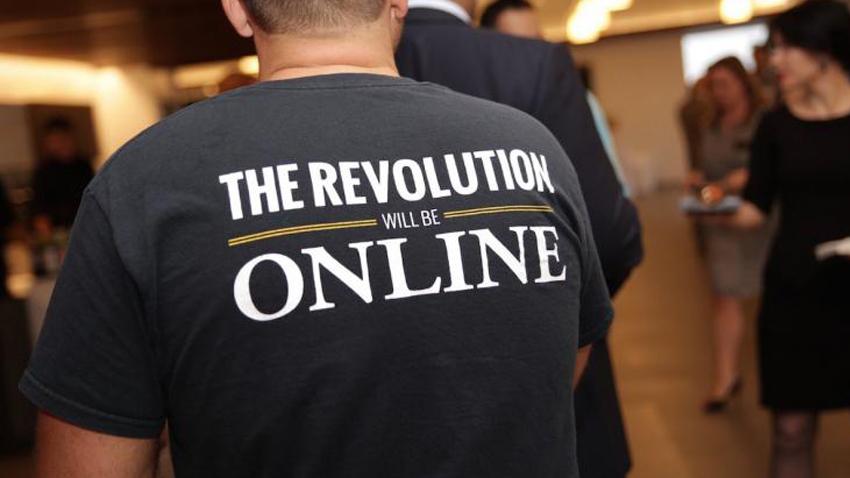 T-shirt reading, "The Revolution Will Be Online"