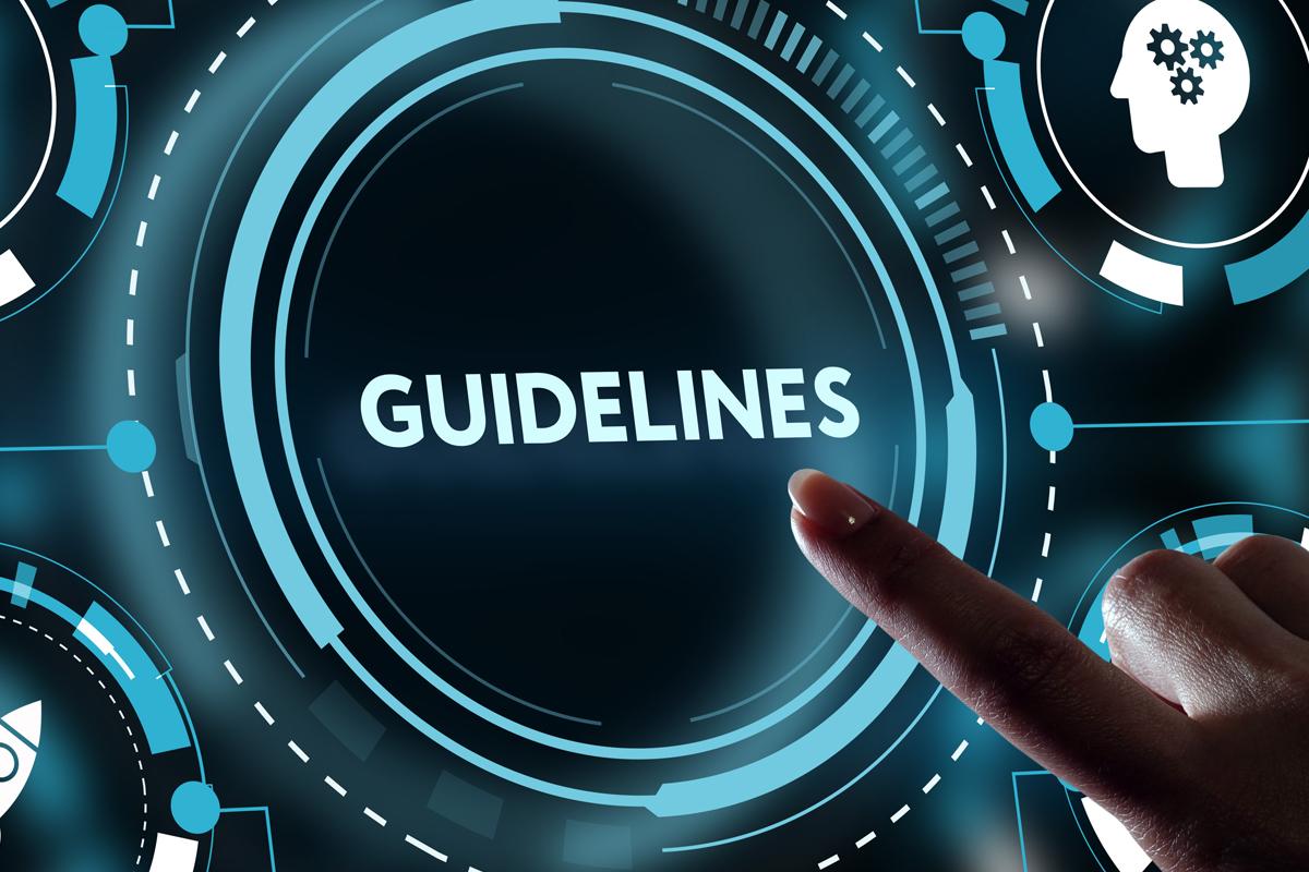 A picture of a finger pushing a virtual button that says "guidelines"